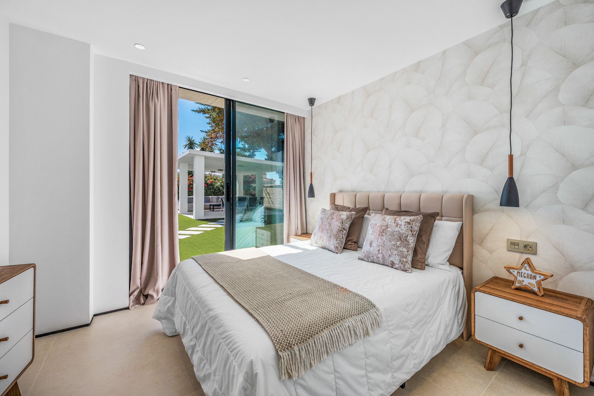 Unique modern 4 bedroom beachside villa in Marbesa