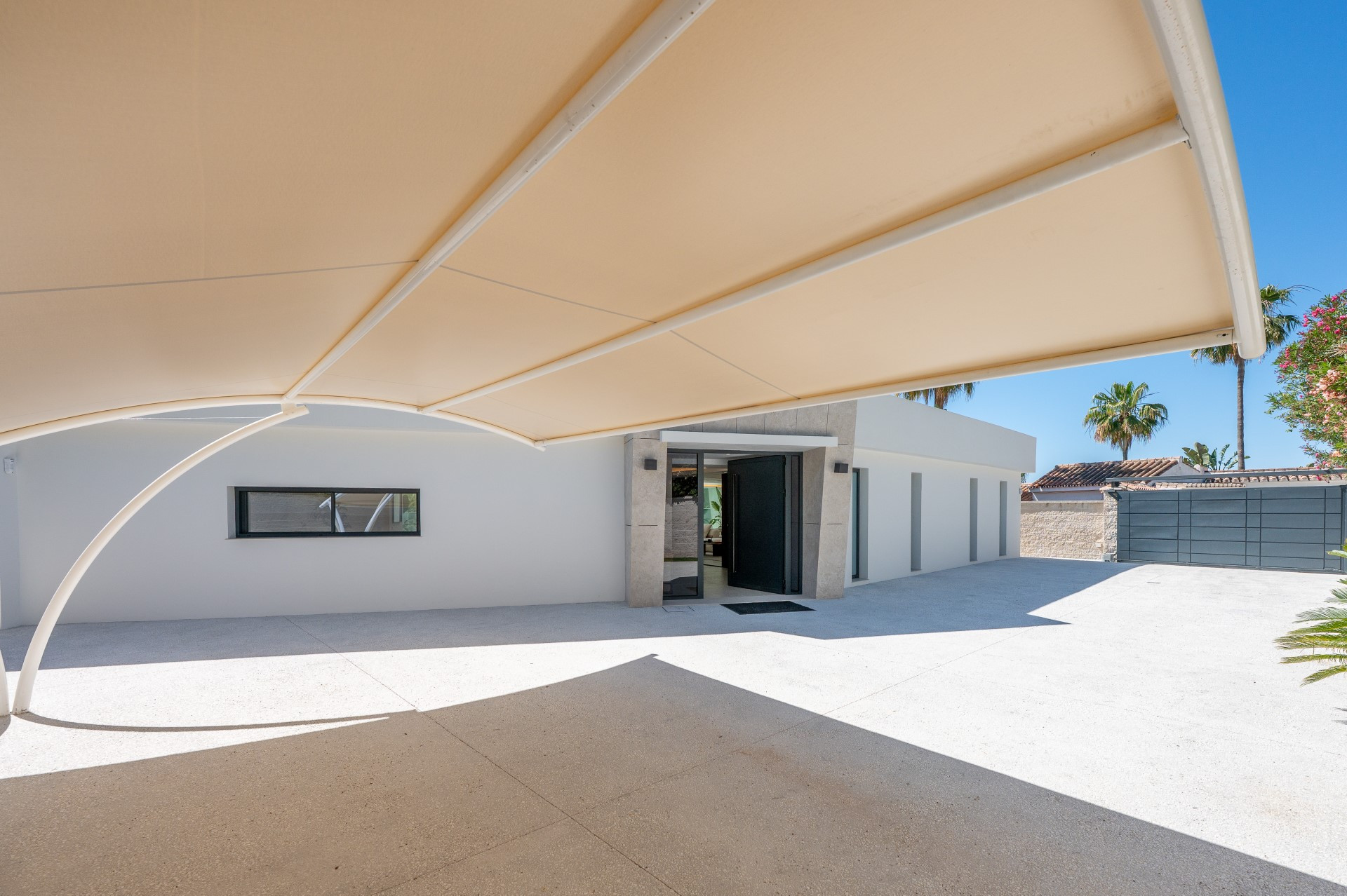 Unique modern 4 bedroom beachside villa in Marbesa