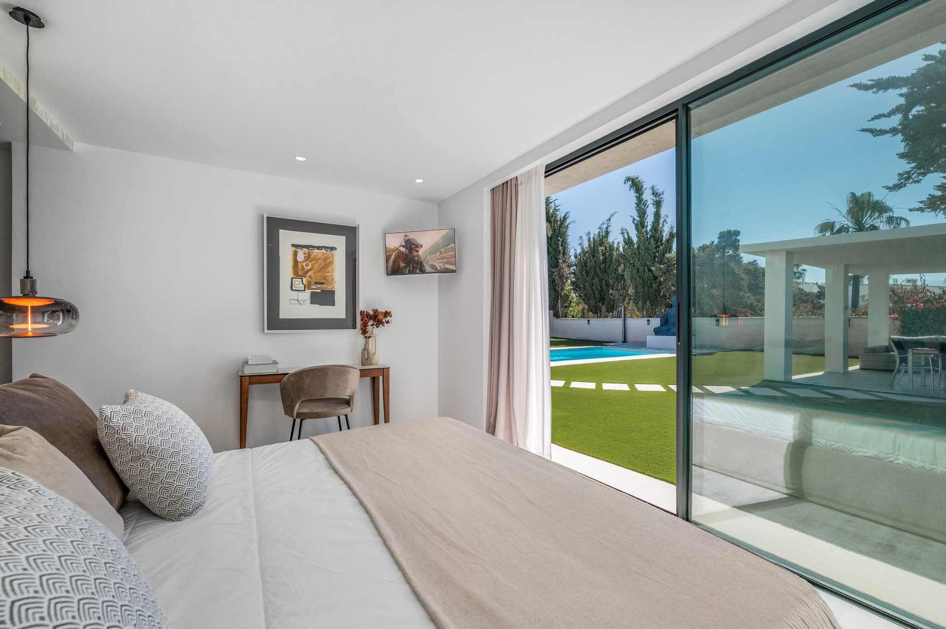 Unique modern 4 bedroom beachside villa in Marbesa