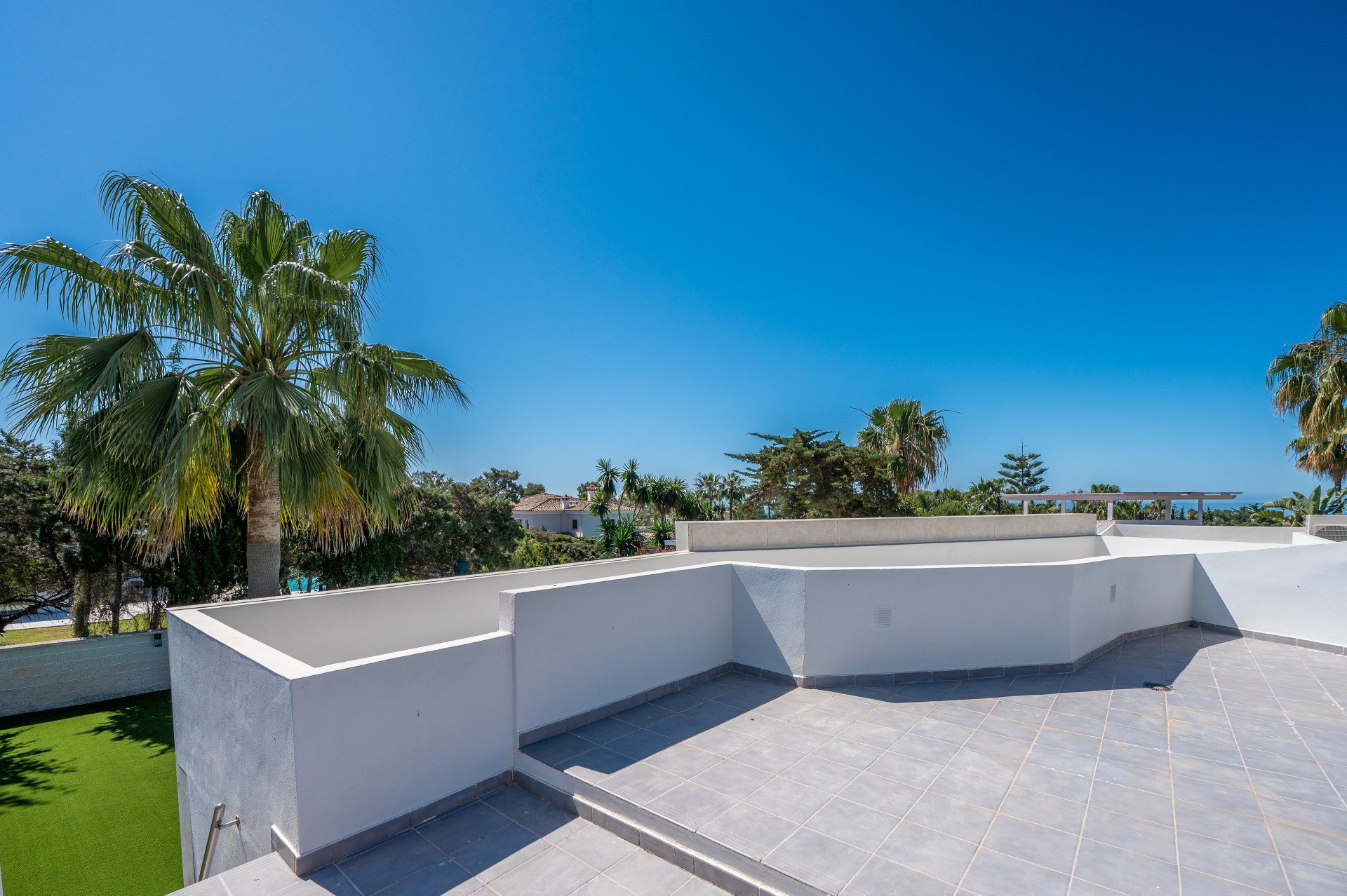 Unique modern 4 bedroom beachside villa in Marbesa