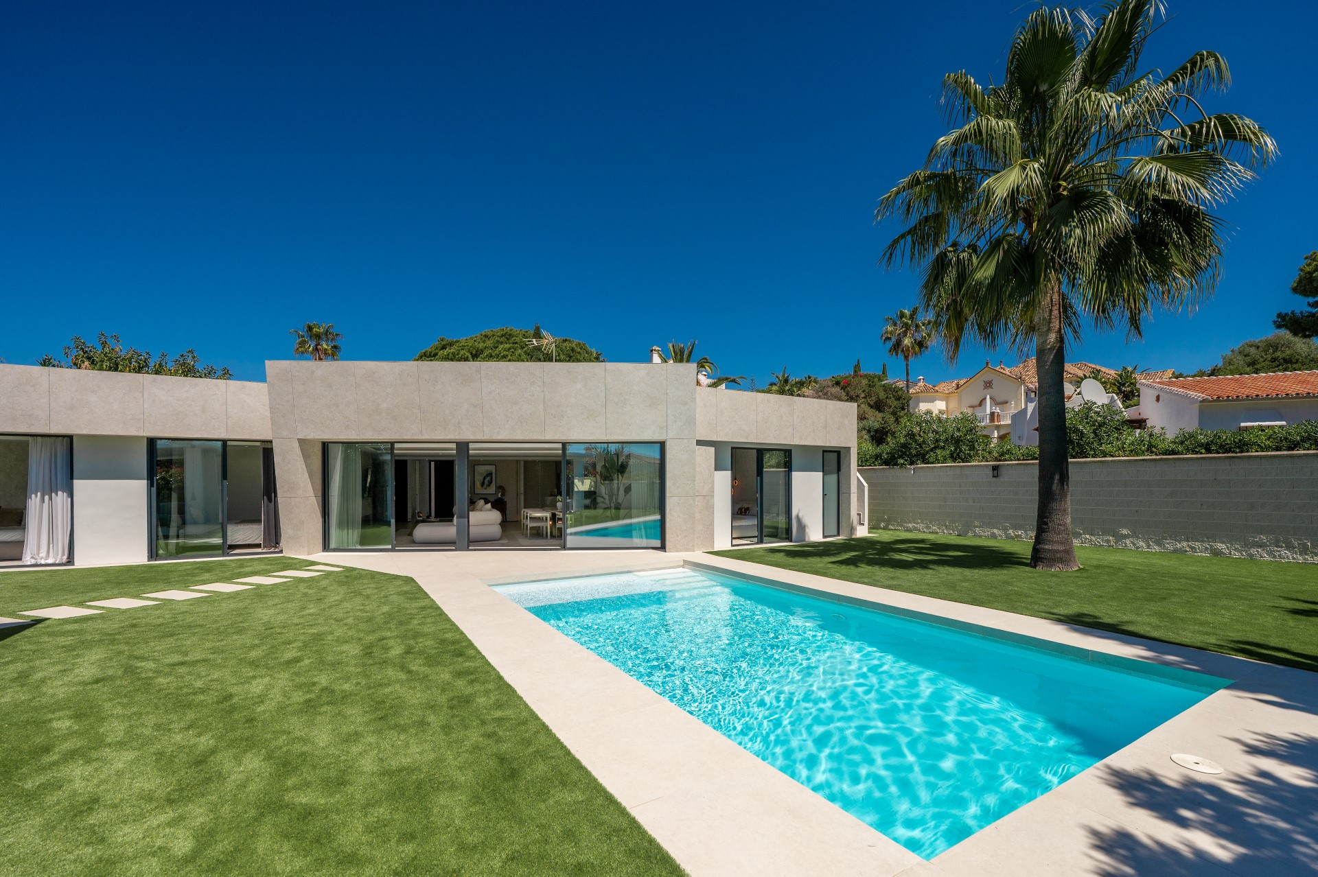 Unique modern 4 bedroom beachside villa in Marbesa