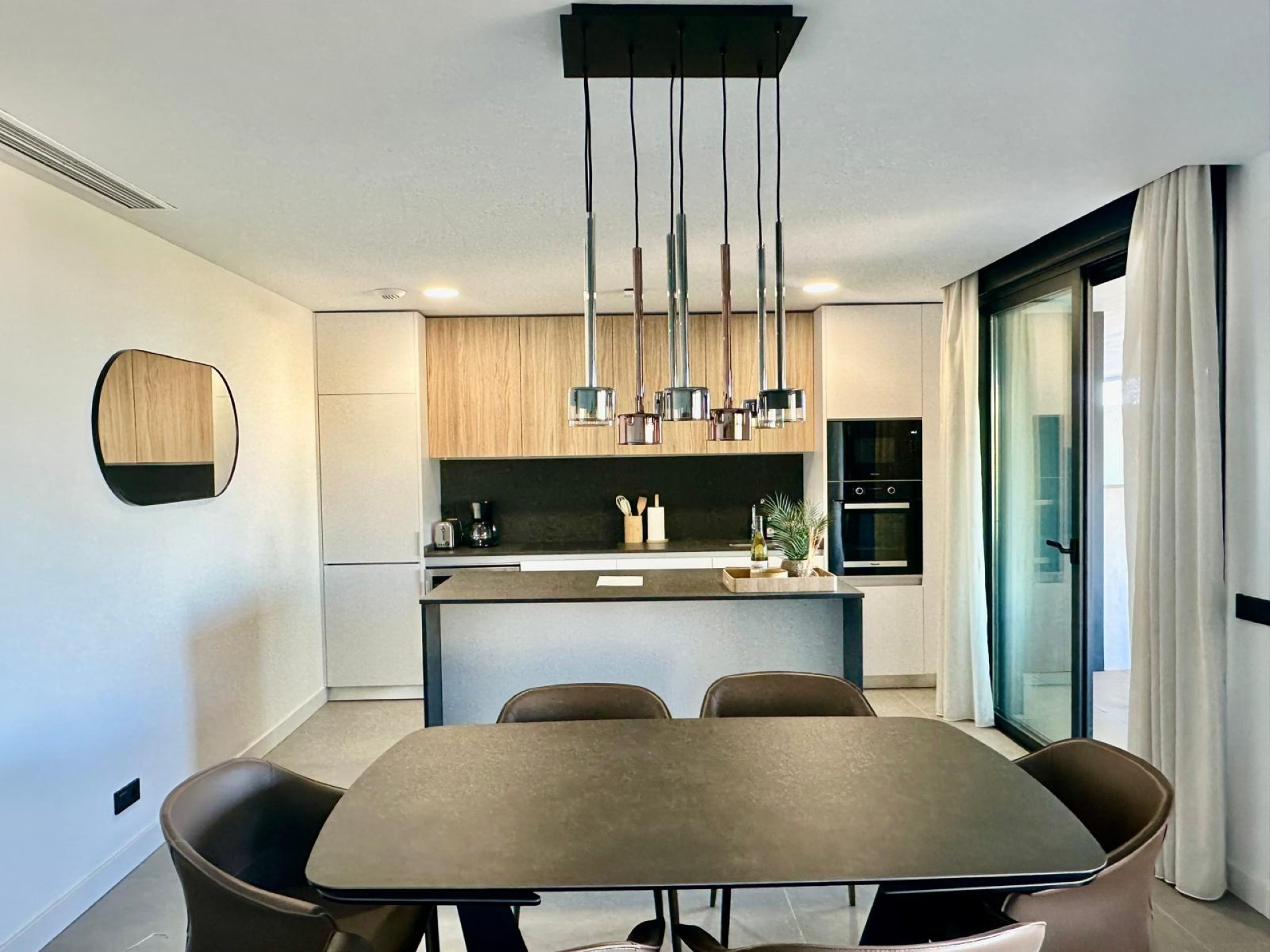 Contemporary stylish apartment with panoramic views in Los Altos de los Monteros, Marbella East