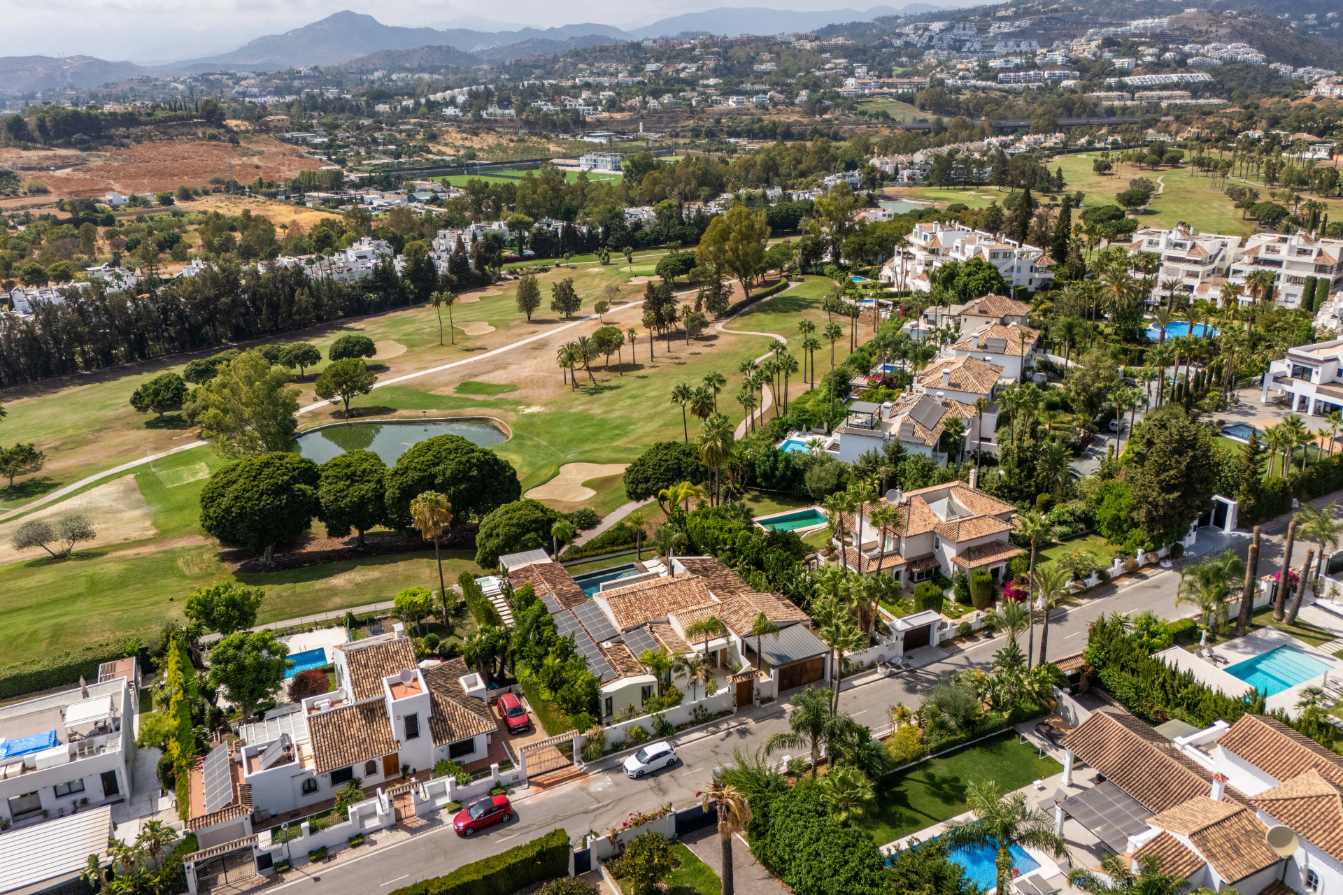 Amazing designer front line villa in a gated complex in Nueva Andalucía in Nueva Andalucia