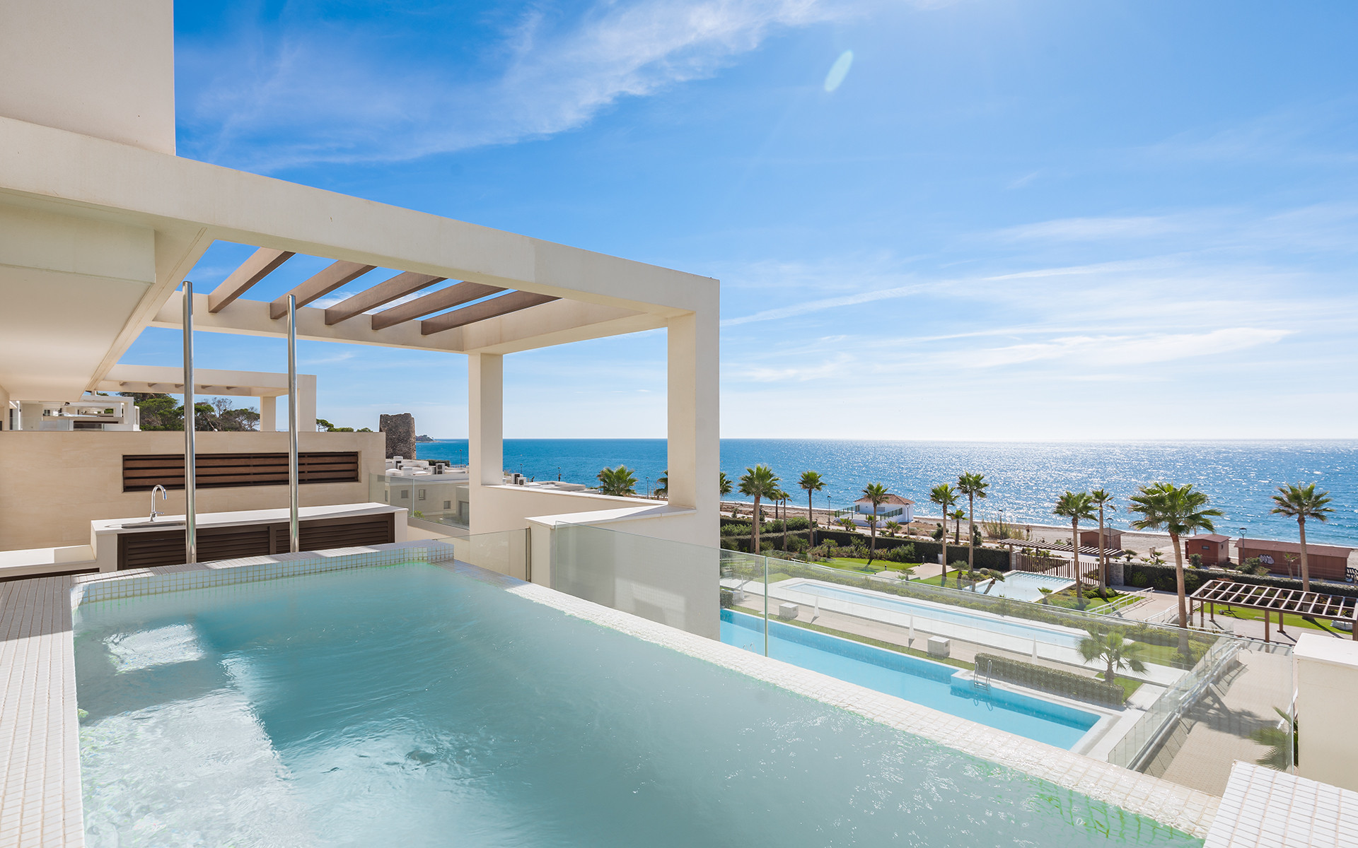 Frontline beach luxury penthouse with panoramic open sea views in Velaya in Estepona