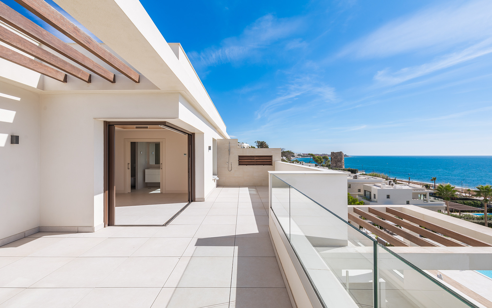 Frontline beach luxury penthouse with panoramic open sea views in Velaya in Estepona