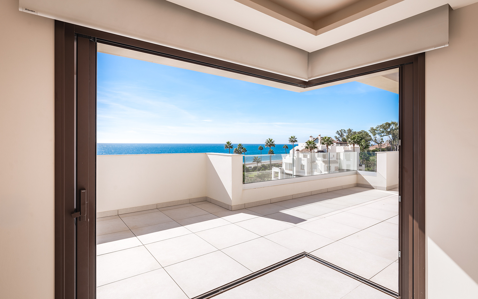 Frontline beach luxury penthouse with panoramic open sea views in Velaya in Estepona