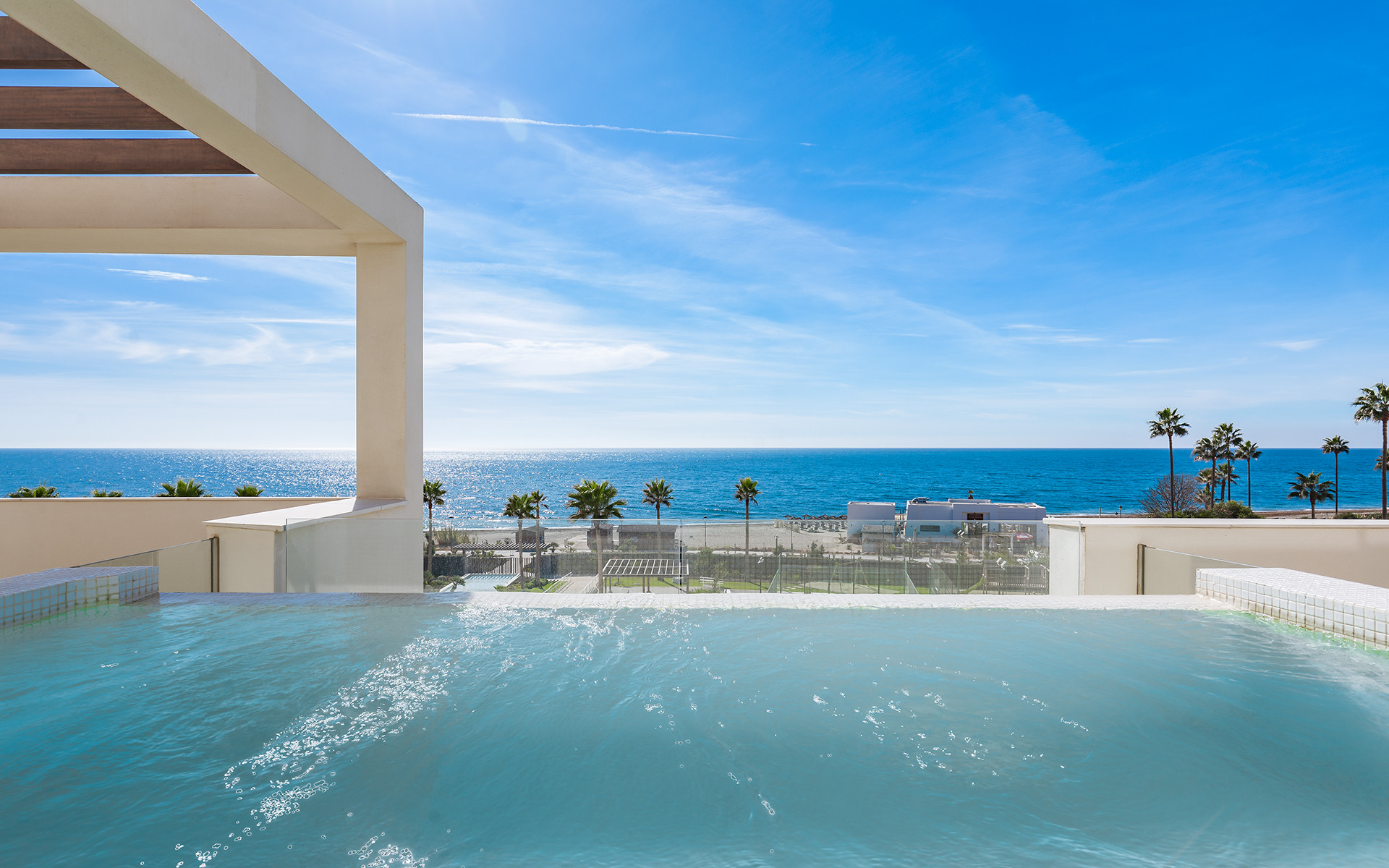 Frontline beach luxury penthouse with panoramic open sea views in Velaya in Estepona