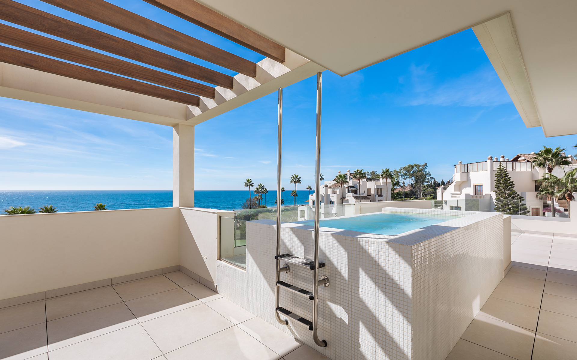 Frontline beach luxury penthouse with panoramic open sea views in Velaya in Estepona