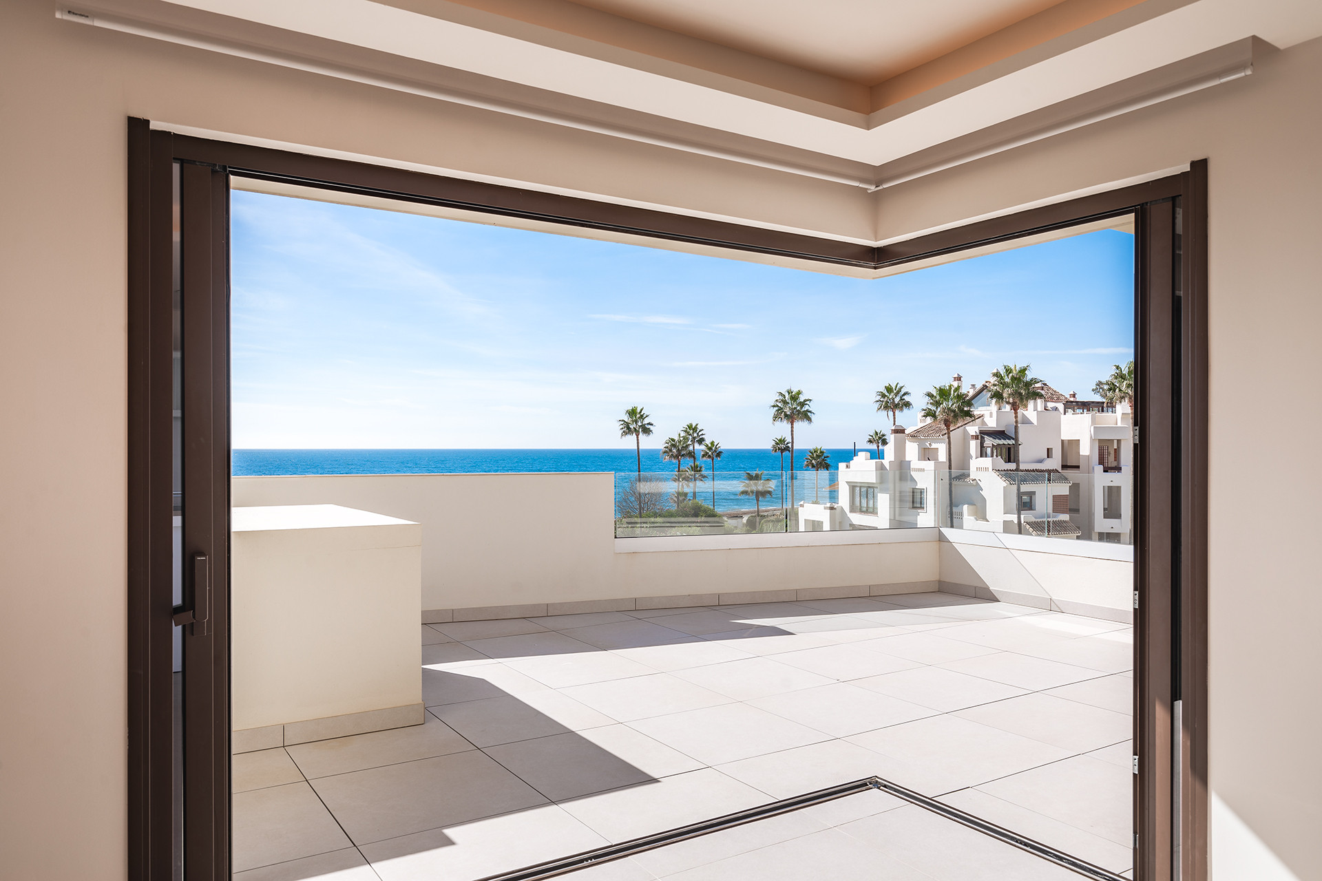 Frontline beach luxury penthouse with panoramic open sea views in Velaya in Estepona