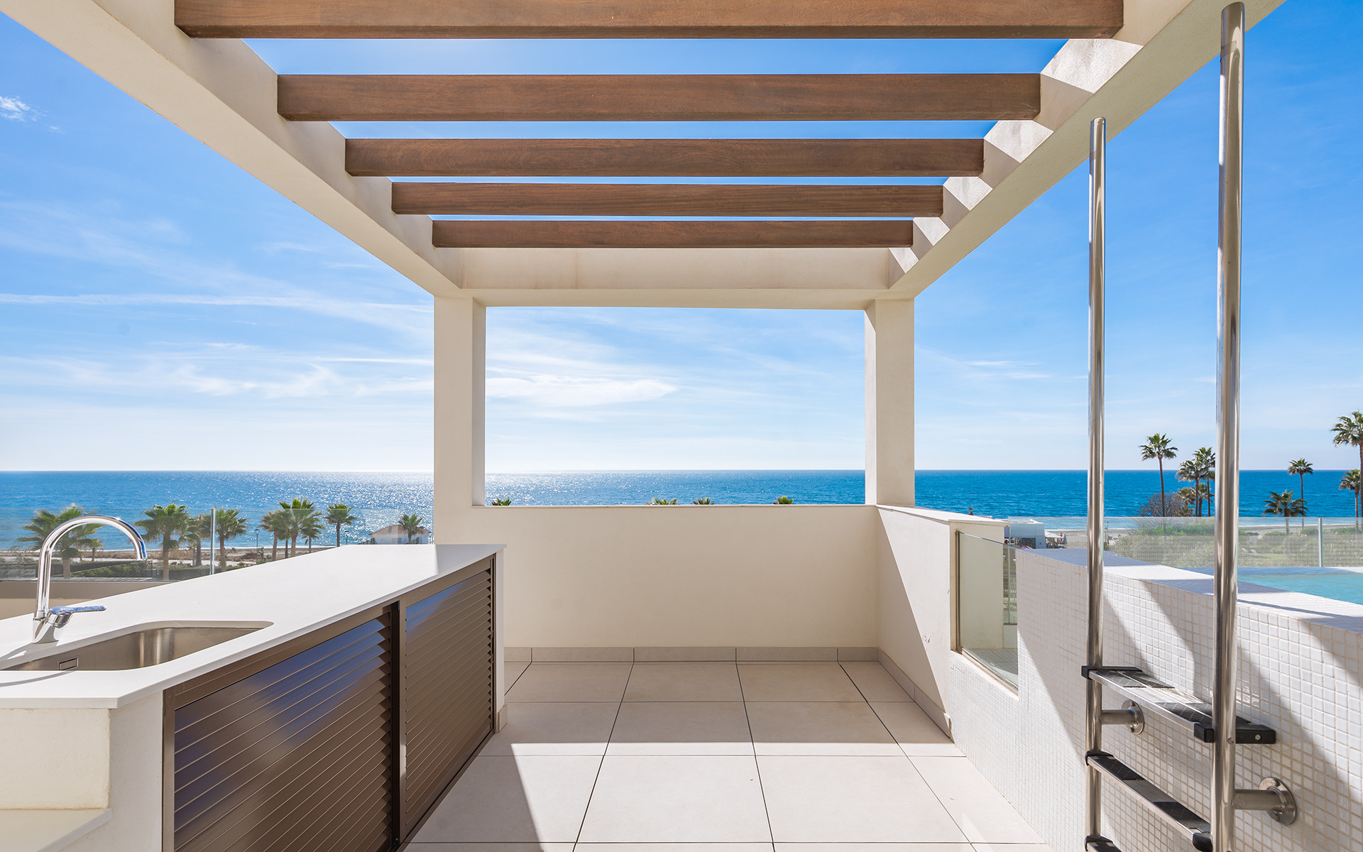 Frontline beach luxury penthouse with panoramic open sea views in Velaya in Estepona