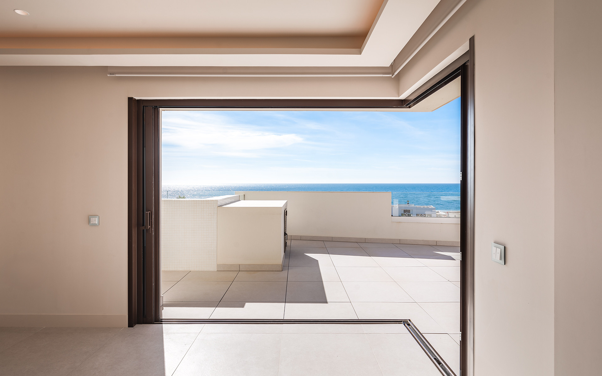 Frontline beach luxury penthouse with panoramic open sea views in Velaya in Estepona