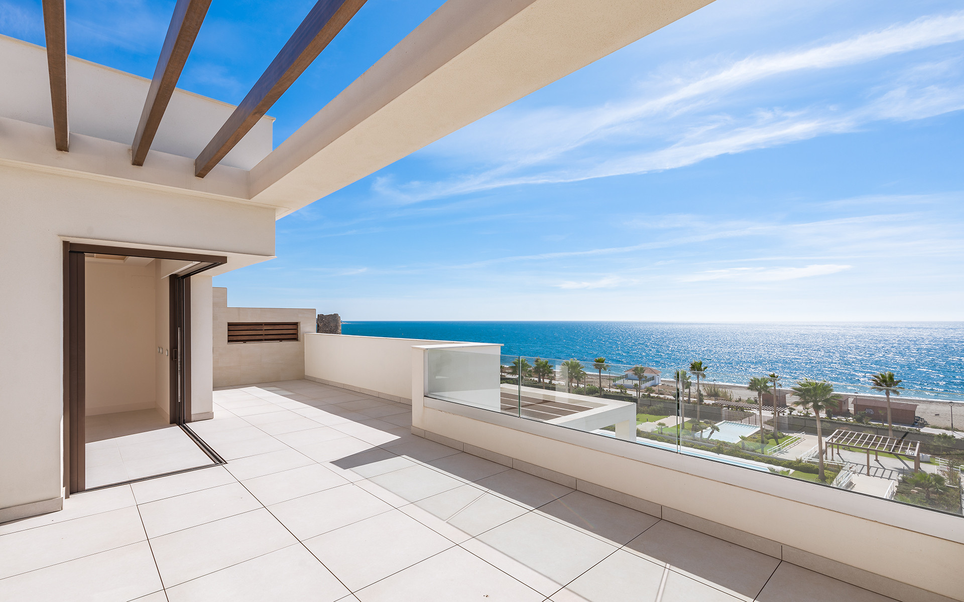 Frontline beach luxury penthouse with panoramic open sea views in Velaya in Estepona