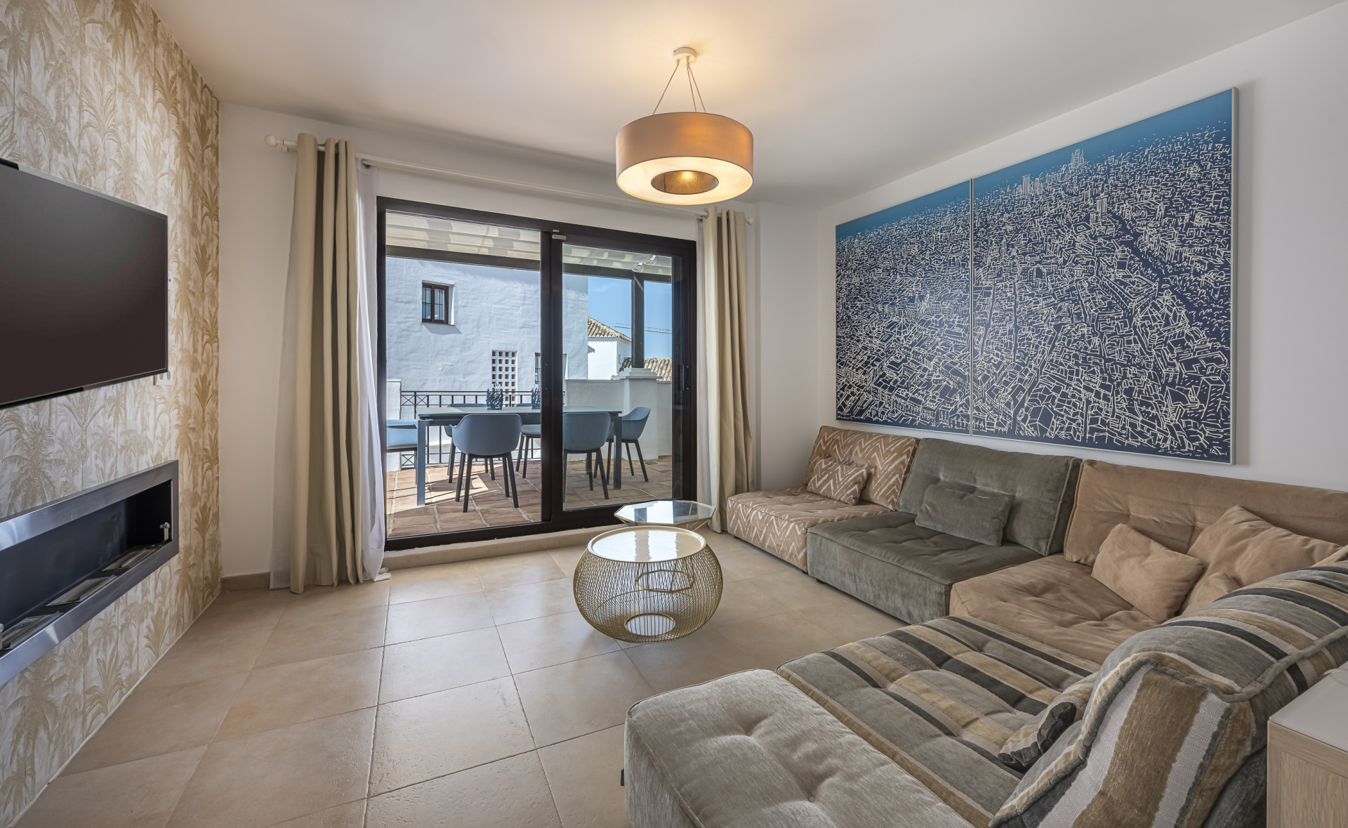 Mediterranean style south-facing triplex located in a gated community in Altos de Los Monteros, East Marbella