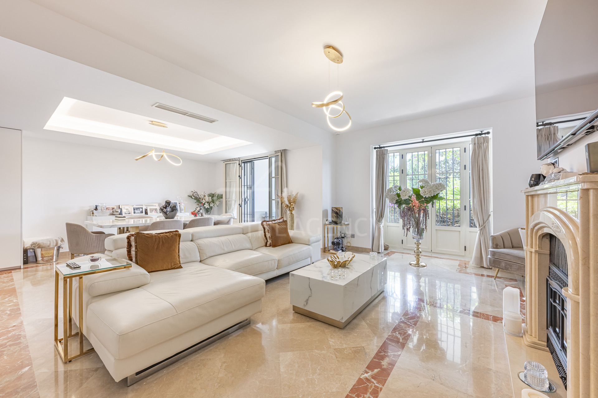 Elegant Townhouse with Private Garden and Expansive Views in Nueva Andalucía’s Golf Valley