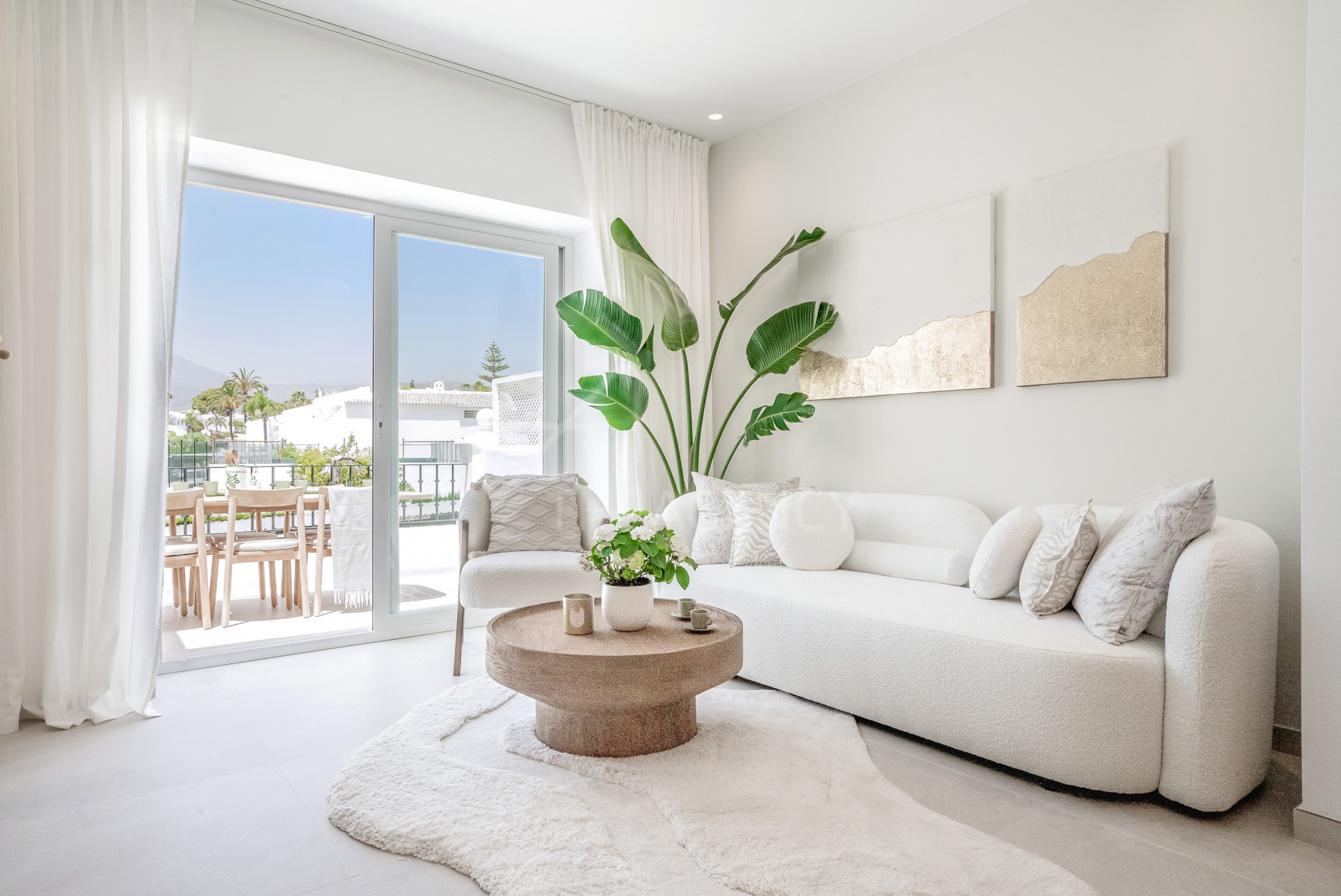 Luxurious Corner Duplex Penthouse with Panoramic Mountain Views and Rooftop Oasis in Nueva Andalucía