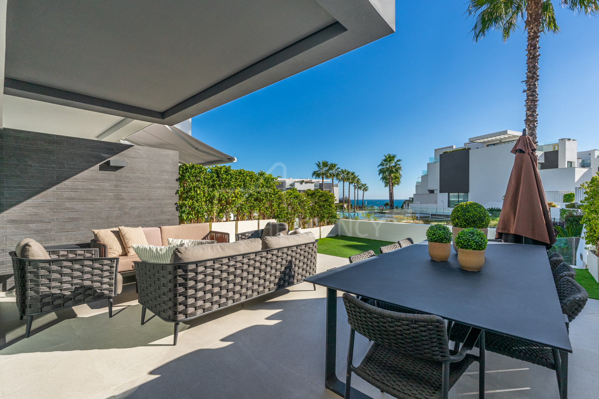 Stunning modern Townhouse with amazing sea views in frontline beach in Estepona.