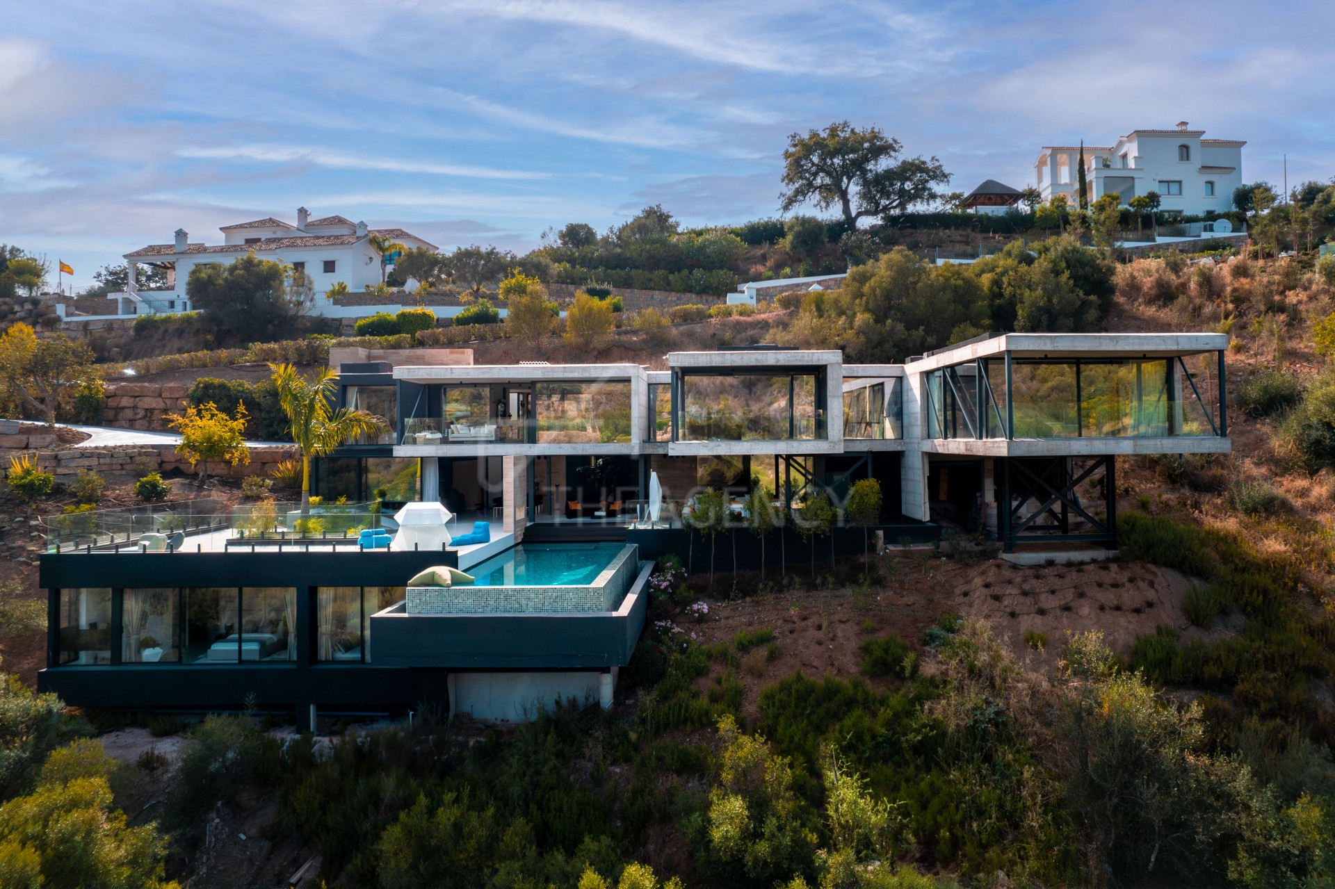 Floating Haven: Exquisite New Modern Villa Along the Golf Course at the Prestigious Marbella Club Golf Resort, Benahavis.
