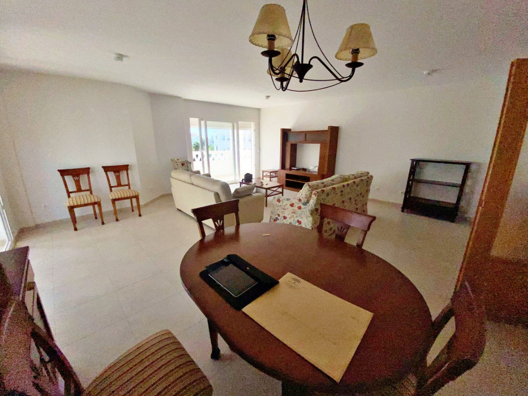 Spacious 4-Bedroom Apartment with Terraces and Parking Space