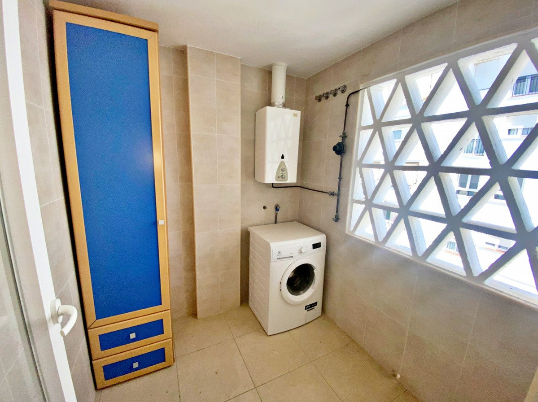 Spacious 4-Bedroom Apartment with Terraces and Parking Space