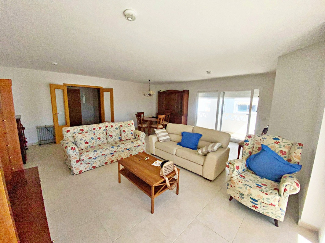 Spacious 4-Bedroom Apartment with Terraces and Parking Space
