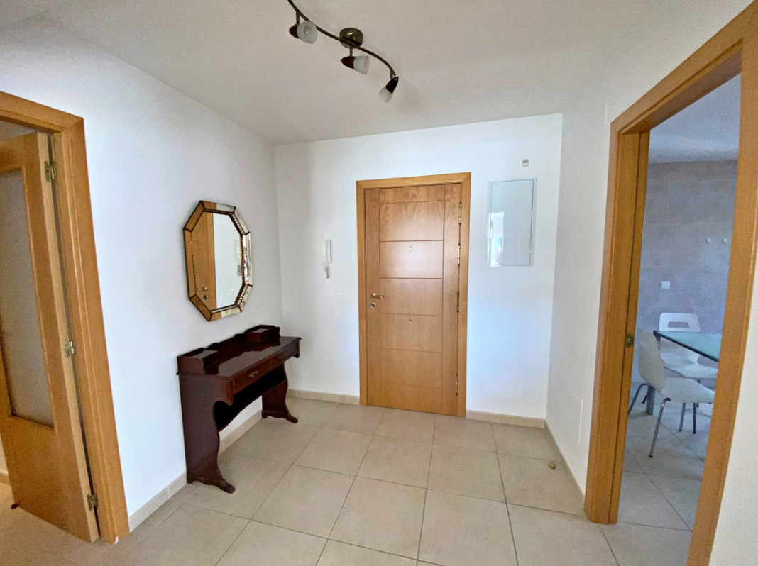 Spacious 4-Bedroom Apartment with Terraces and Parking Space