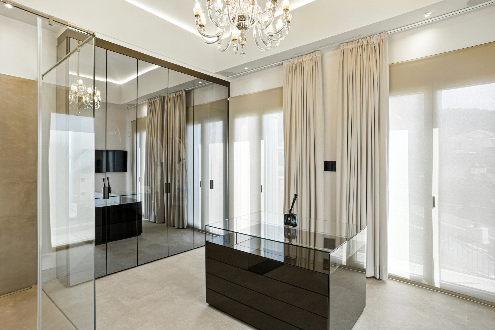 An architecturally unique, south-facing property located in the exclusive gated community of Sierra Blanca on Marbella’s prestigious Golden Mile