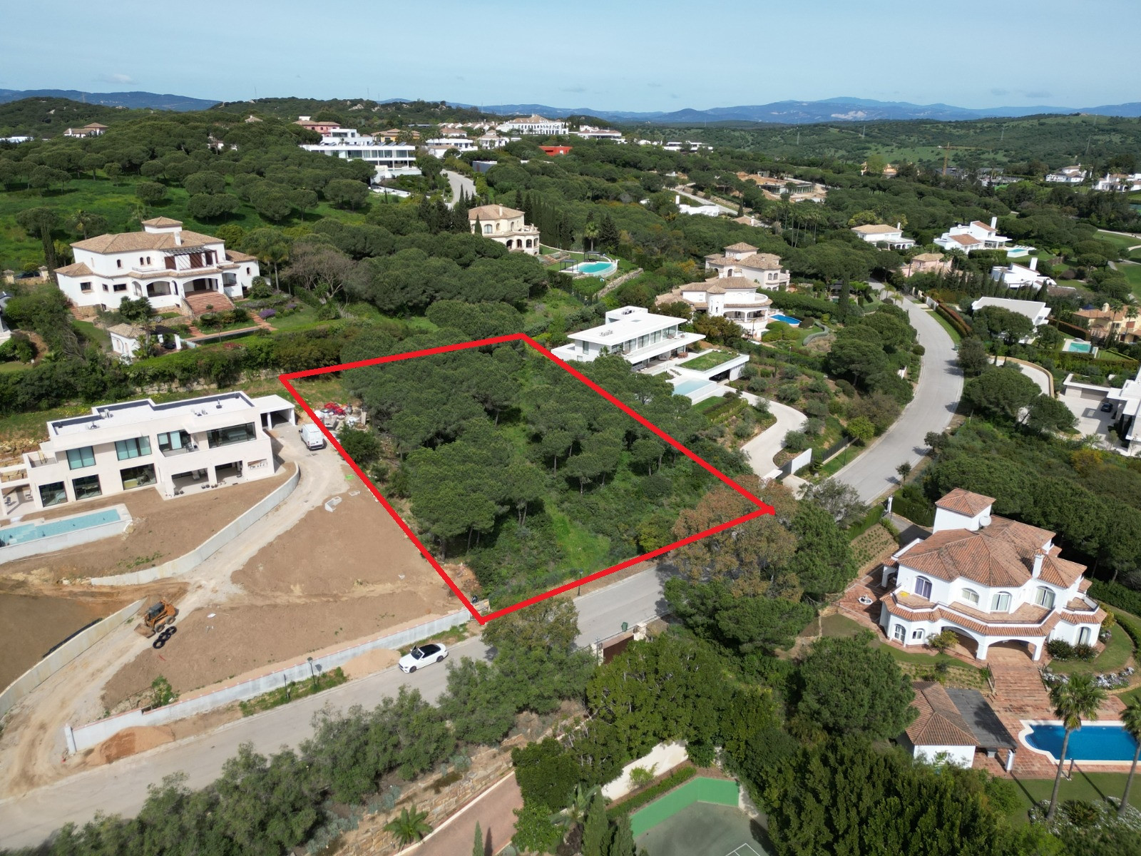 SEA & GOLF VIEW PLOT WITH BUILDING LICENCE & APPROVED VILLA PROJECT — ALMENARA GOLF, SOTOGRANDE