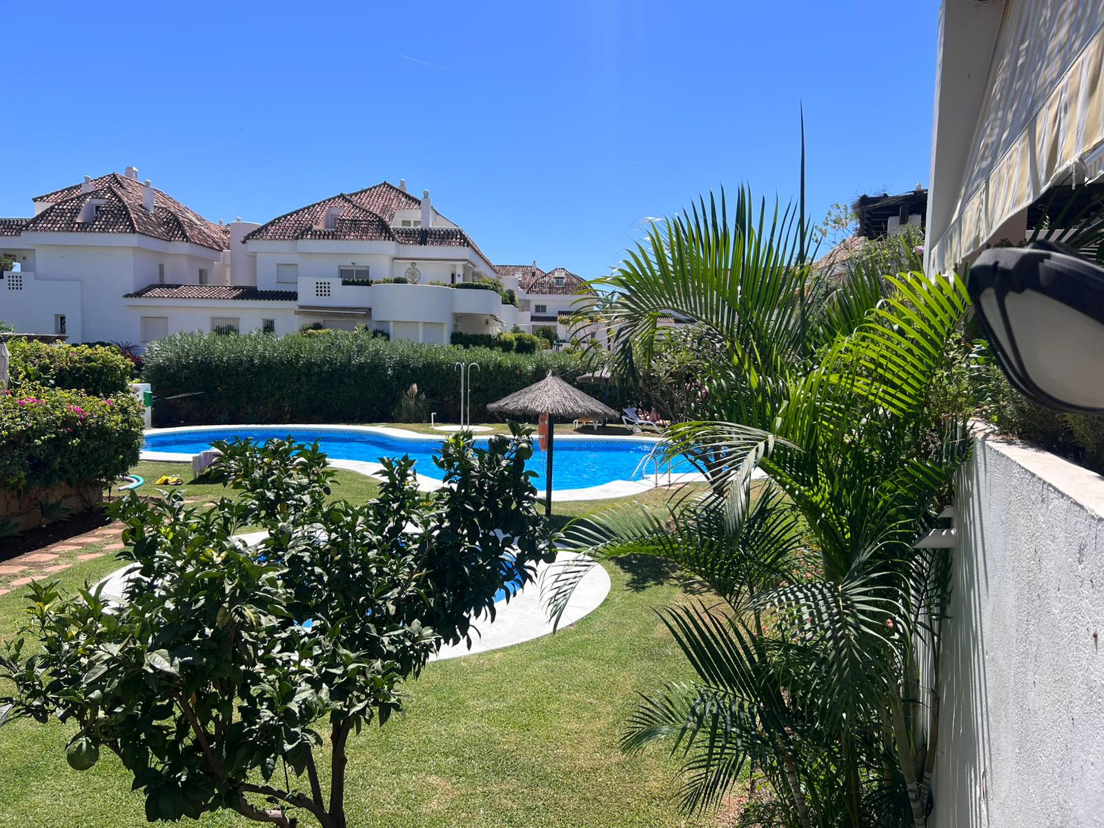 Elegant Marbella apartment with terrace and modern bathroom.