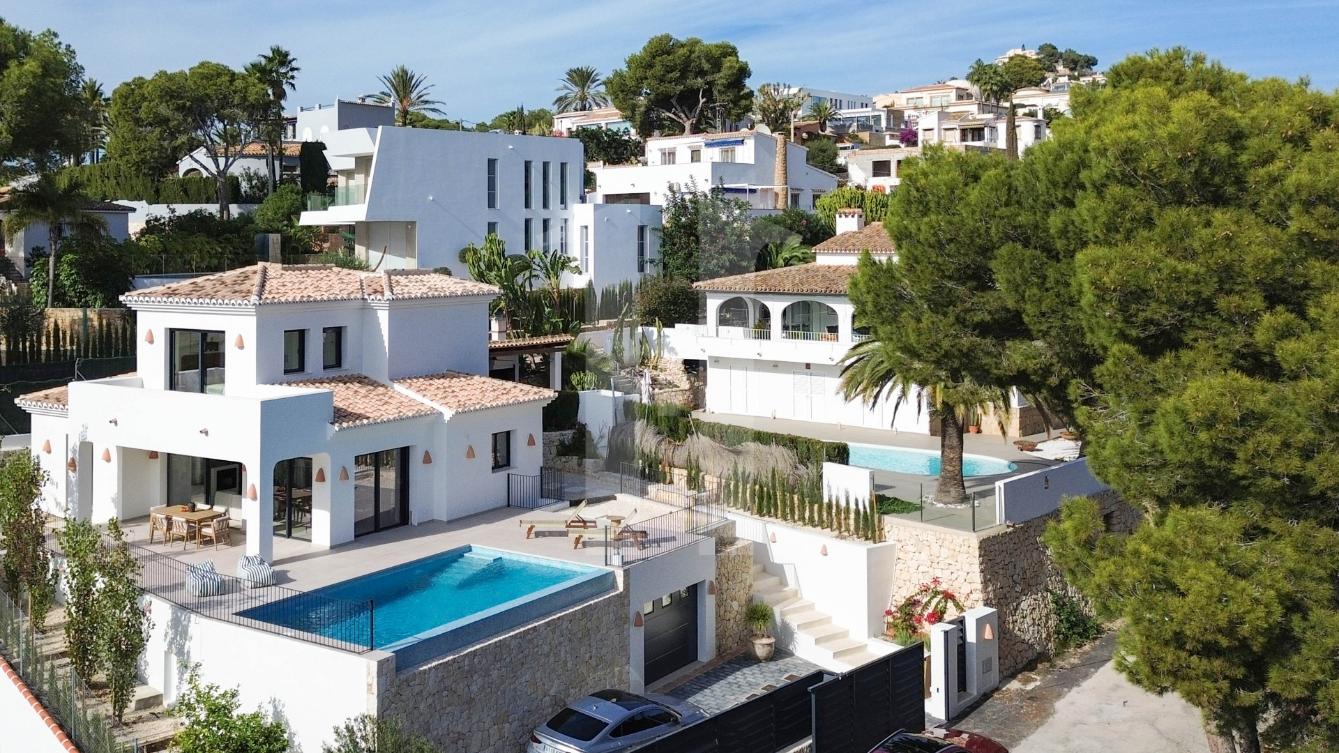 Exclusiva casa de obra nueva en El Portet con piscina y vistas al mar