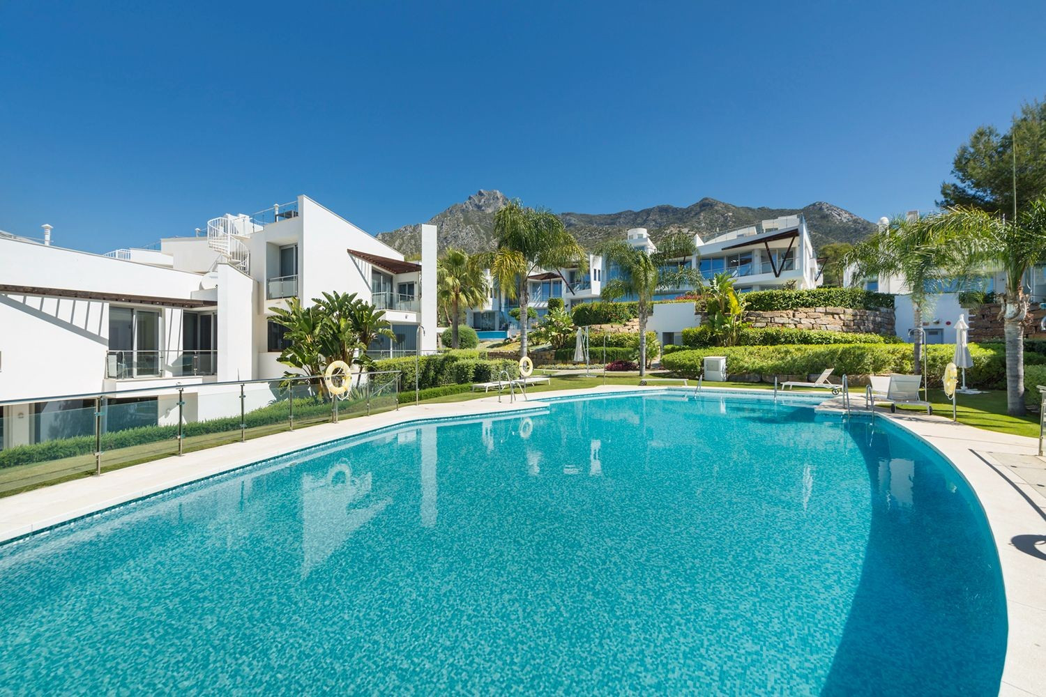 Luxury gated community with amenities.