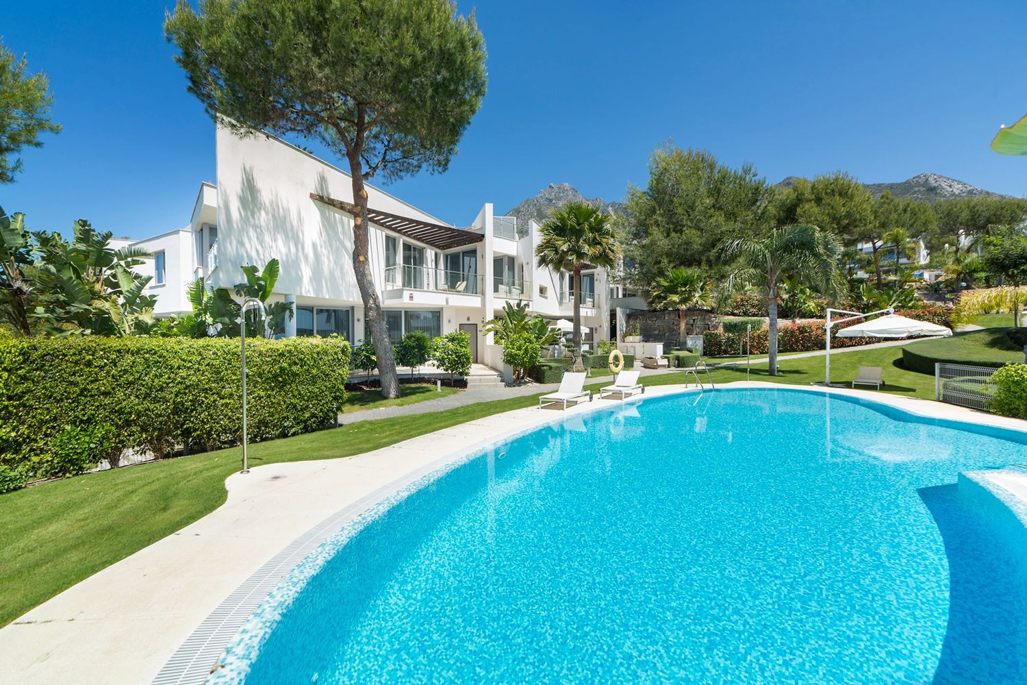 Luxury gated community with amenities.
