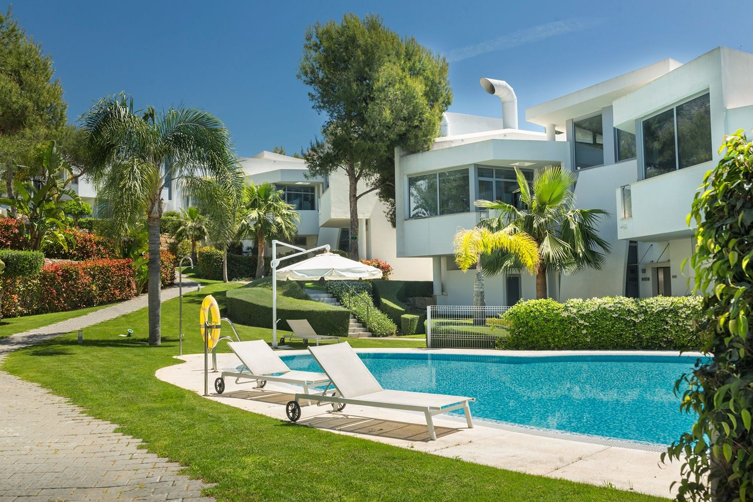Luxury gated community with amenities.