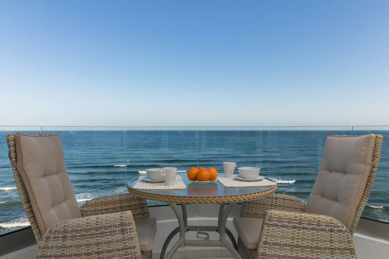 This exclusive 4th-floor apartment is a true coastal sanctuary, offering uninterrupted sea views and direct access to pristine beaches and lush communal gardens.