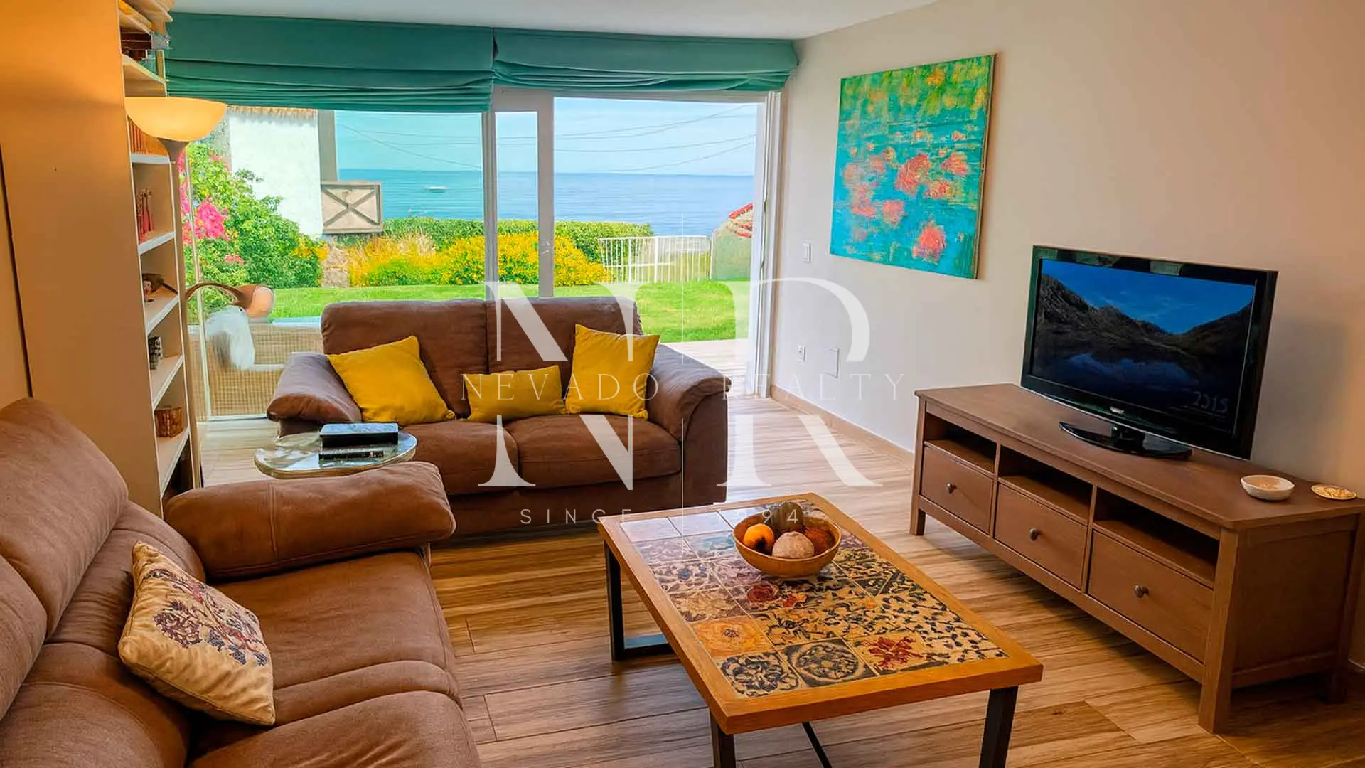 Casa adosada en Bahía Dorada en primera línea de playa en venta