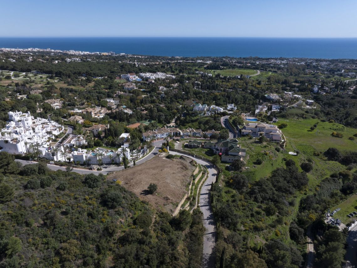 Aerial view of Marbella Hill Club plot VN032910 above the Golden Mile and Mediterranean coastline