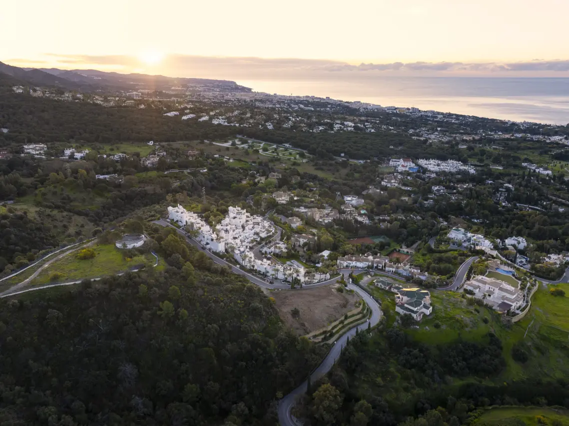 Wide coastal aerial view of the plot
