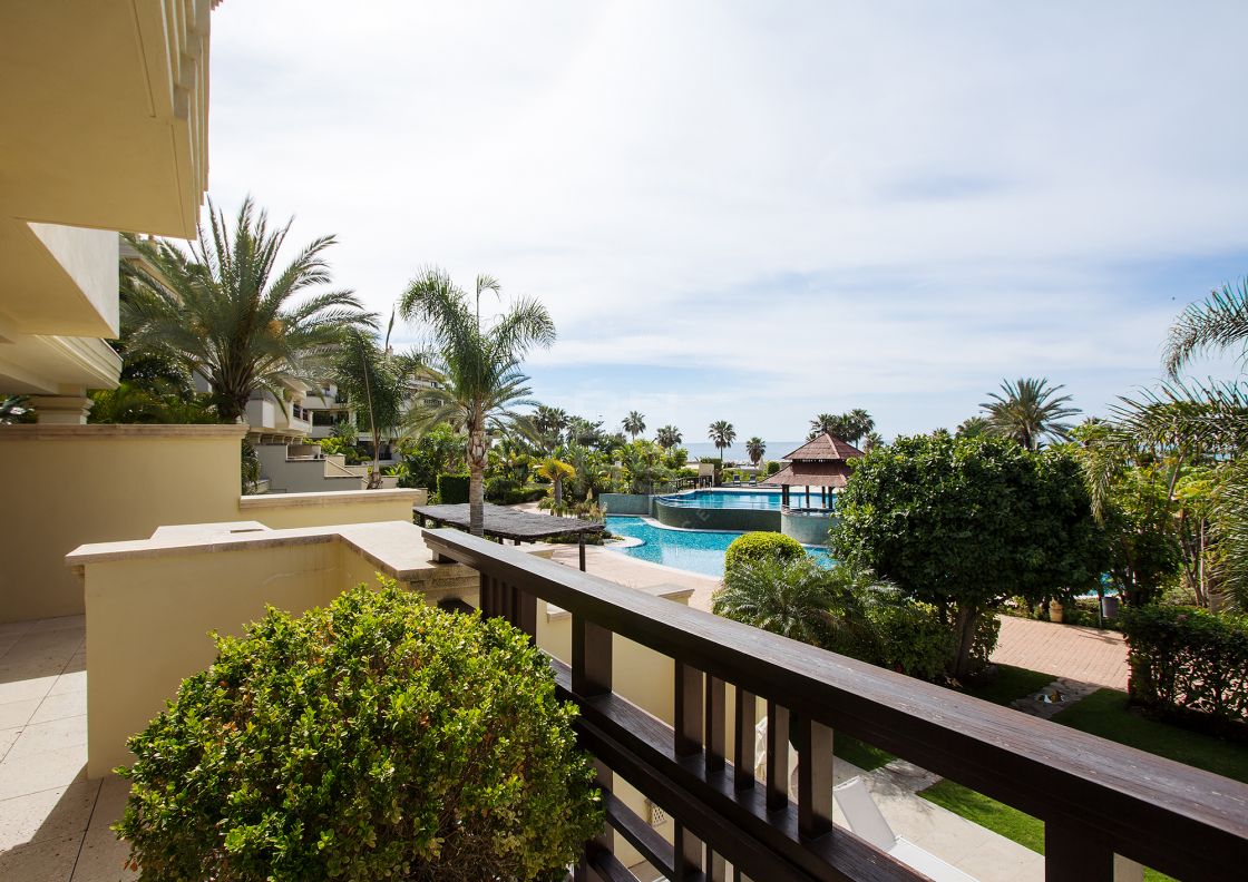 Spectacular fully renovated frontline beach duplex apartment with private pool and garden