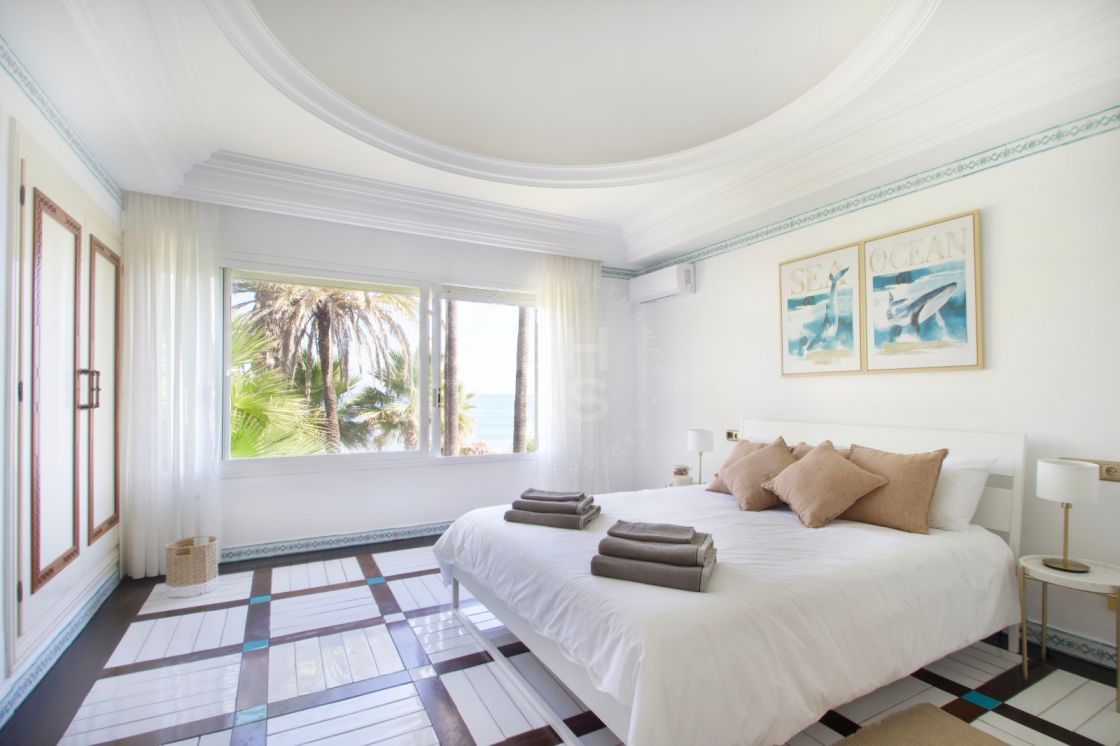 Unique beachfront villa set in Marbella's most desirable address, The Golden Mile.