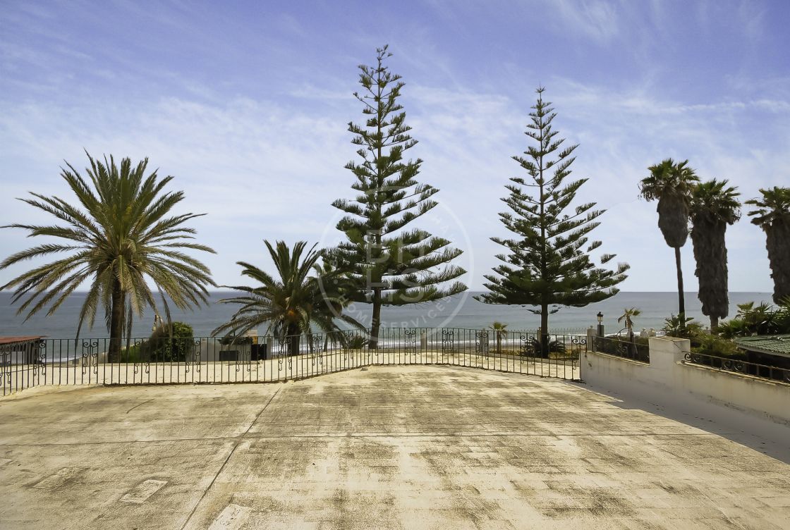 Unique beachfront villa set in Marbella's most desirable address, The Golden Mile.