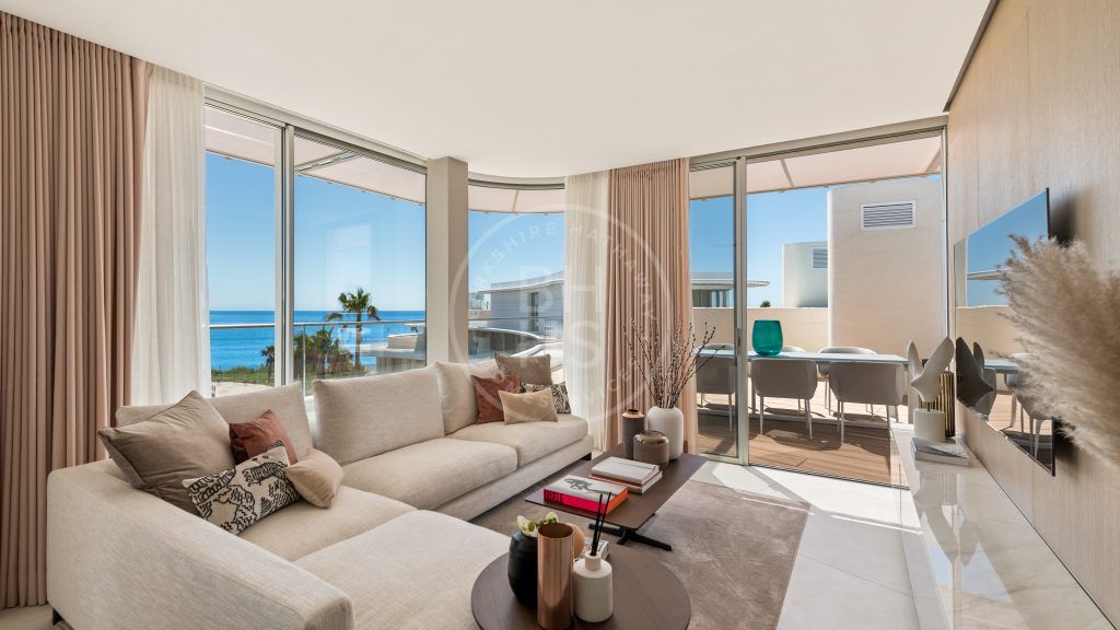 Modern first-floor apartment in new frontline beach development