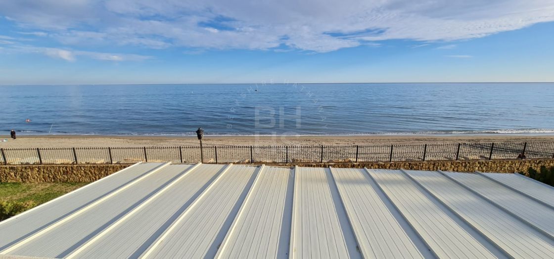 Unique beachfront villa set in Marbella's most desirable area, the Golden Mile