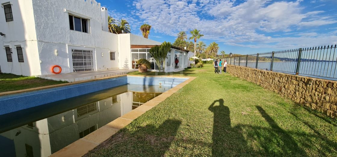 Unique beachfront villa set in Marbella's most desirable area, the Golden Mile
