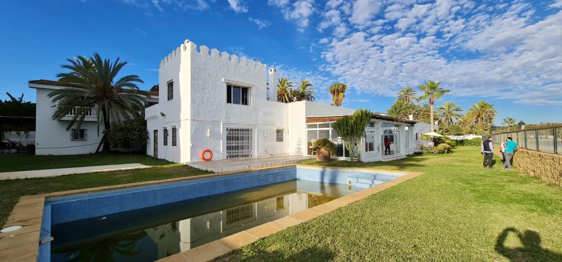 Unique beachfront villa set in Marbella's most desirable area, the Golden Mile