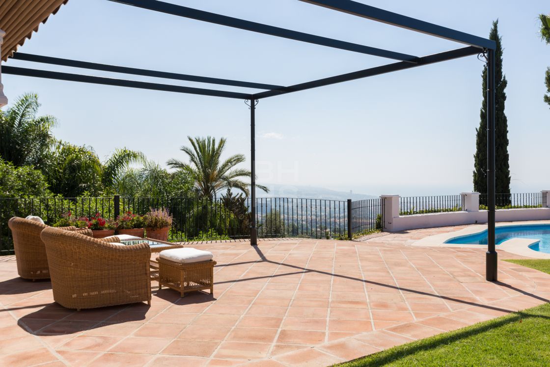 Elegant Andalusian-style villa with Moorish features in Sierra Blanca, one of the most prestigious gated residential areas on Marbella’s Golden Mile