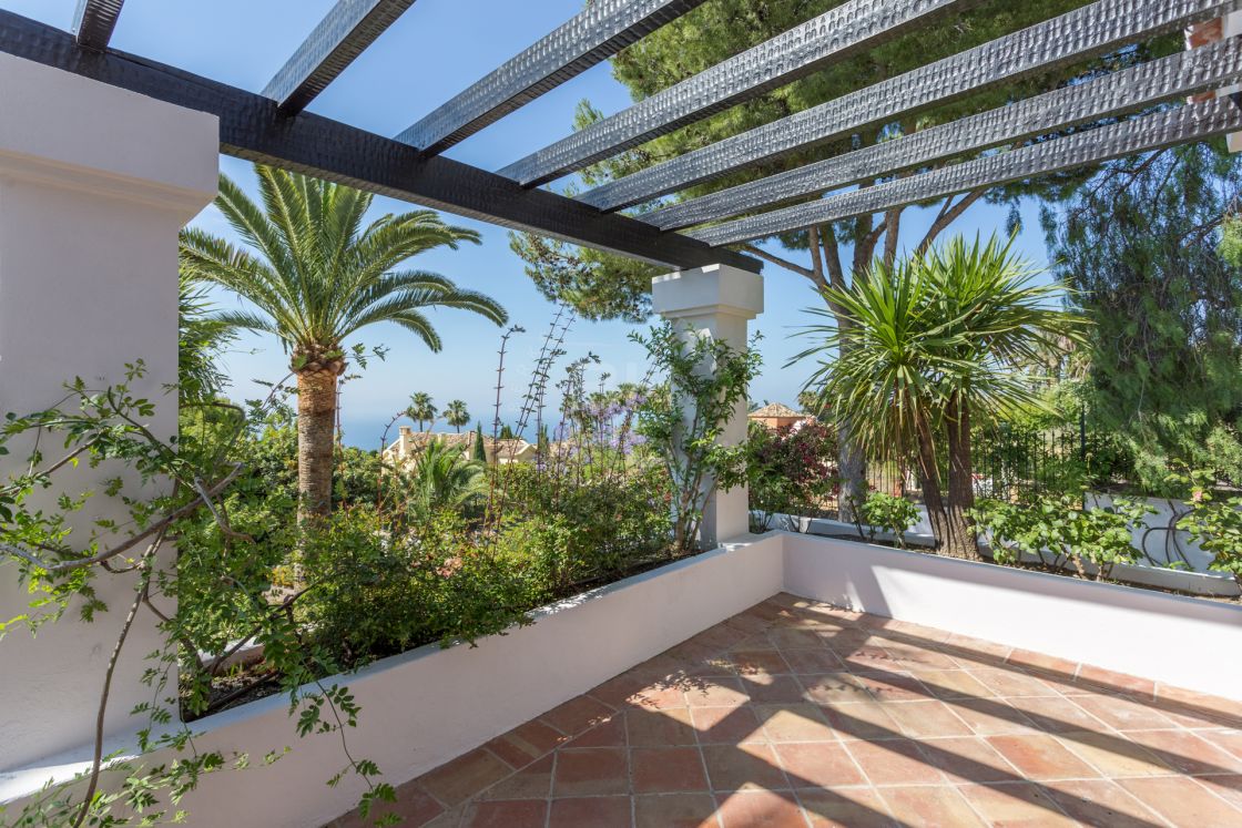 Elegant Andalusian-style villa with Moorish features in Sierra Blanca, one of the most prestigious gated residential areas on Marbella’s Golden Mile