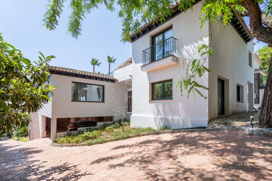 Elegant Andalusian-style villa with Moorish features in Sierra Blanca, one of the most prestigious gated residential areas on Marbella’s Golden Mile
