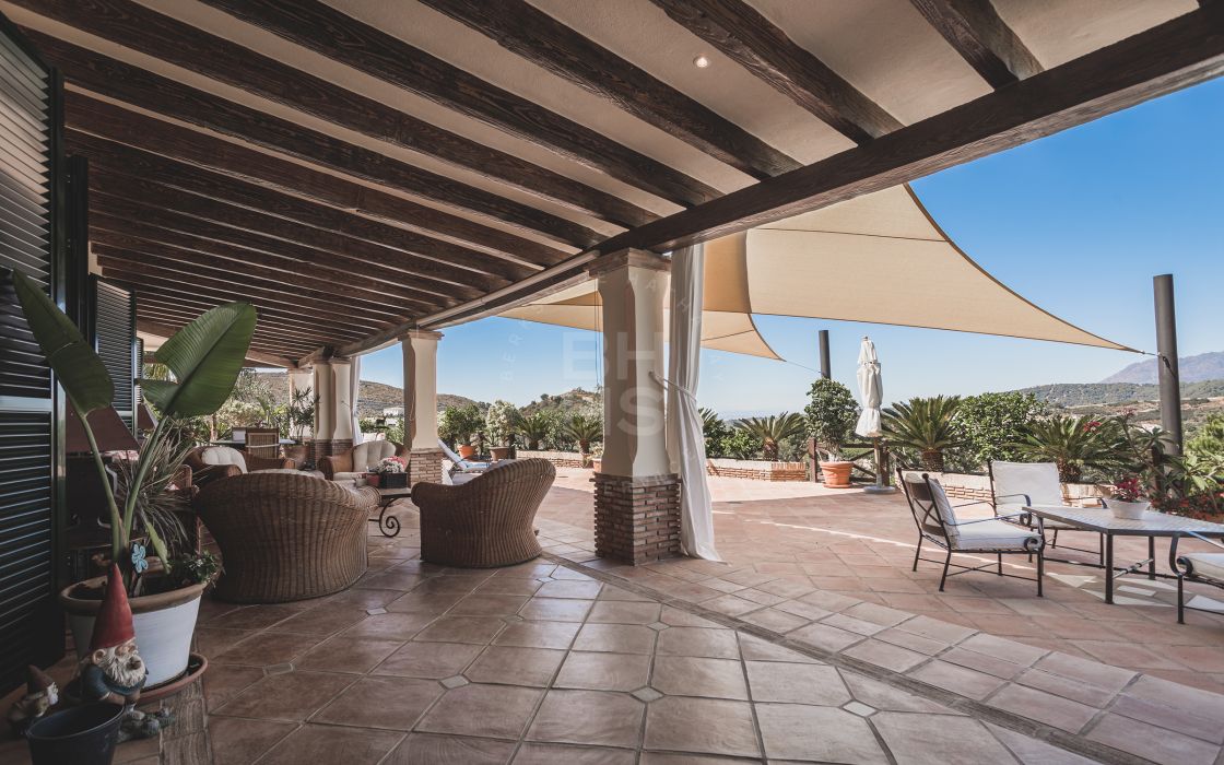 Impressive elegant Andalusian-style front line golf villa with panoramic golf and mountain views in Marbella Club Golf Resort