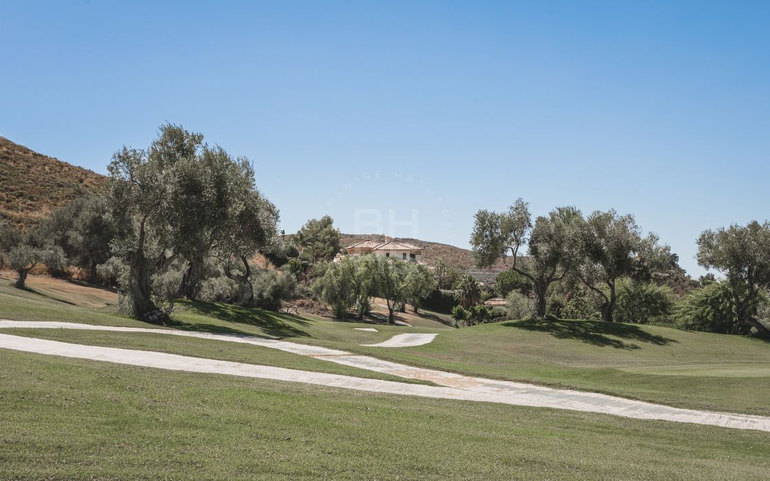 Impressive elegant Andalusian-style front line golf villa with panoramic golf and mountain views in Marbella Club Golf Resort