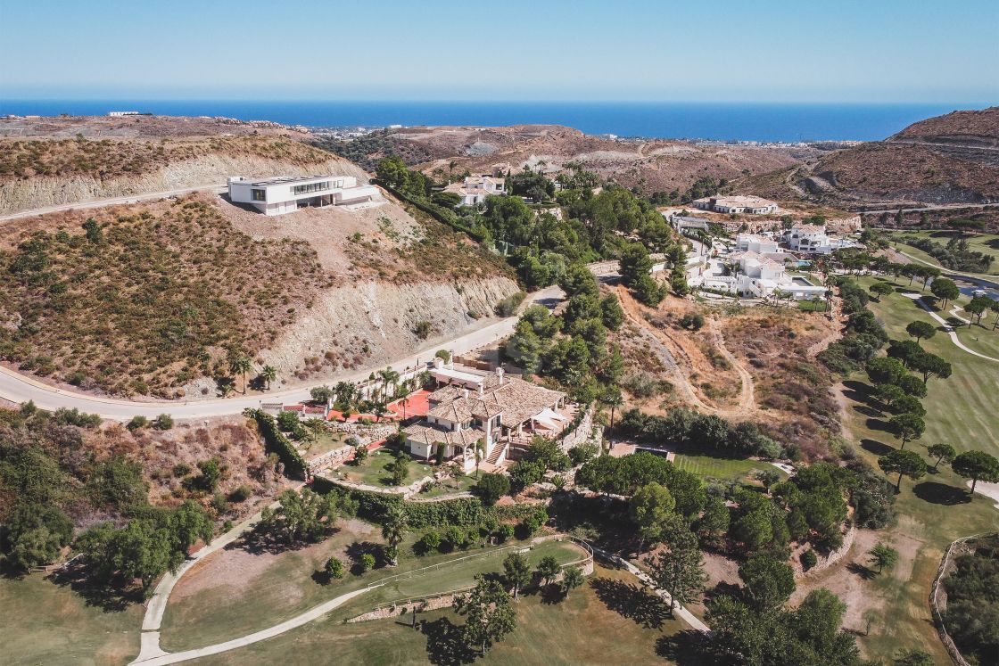 Impressive elegant Andalusian-style front line golf villa with panoramic golf and mountain views in Marbella Club Golf Resort
