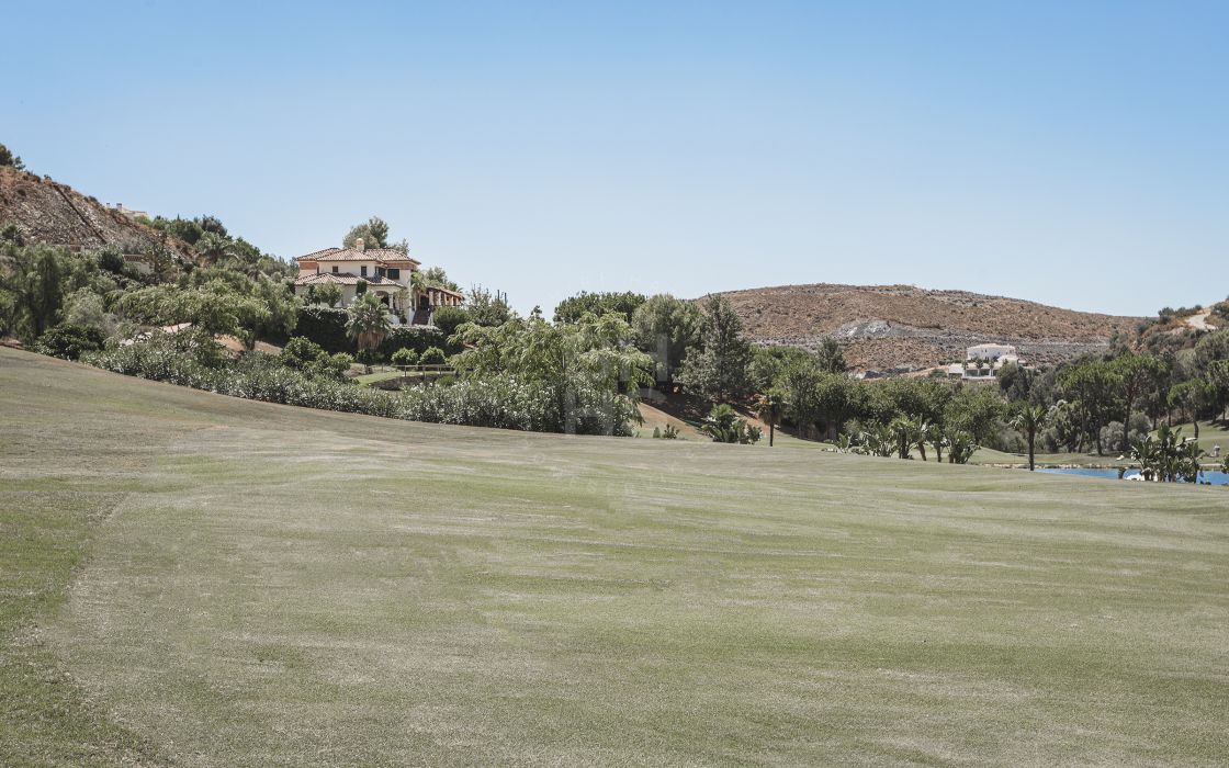 Impressive elegant Andalusian-style front line golf villa with panoramic golf and mountain views in Marbella Club Golf Resort